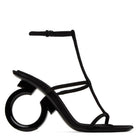 Black suede Elina sandal by Salvatore Ferragamo, sole and heel construction view