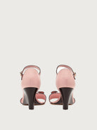 Light pink leather sandal with buckle ankle strap, rear view by Salvatore Ferragamo