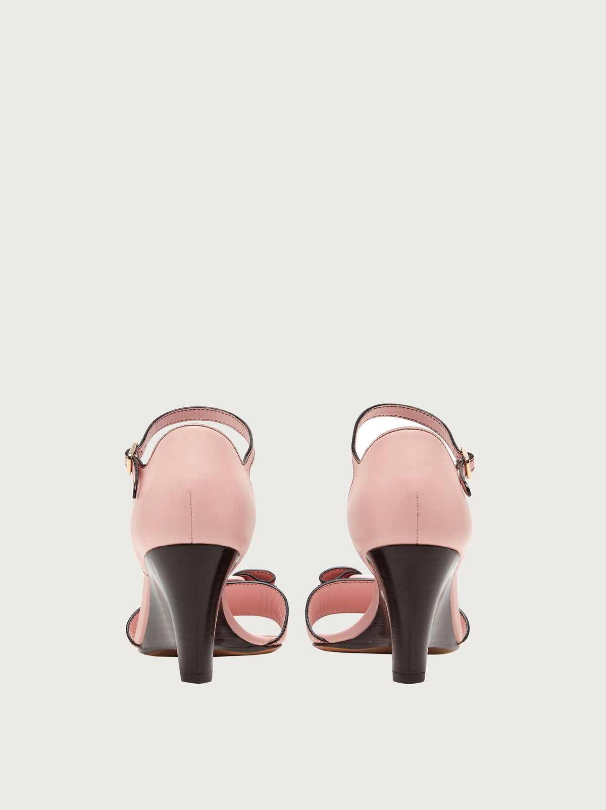 Light pink leather sandal with buckle ankle strap, rear view by Salvatore Ferragamo