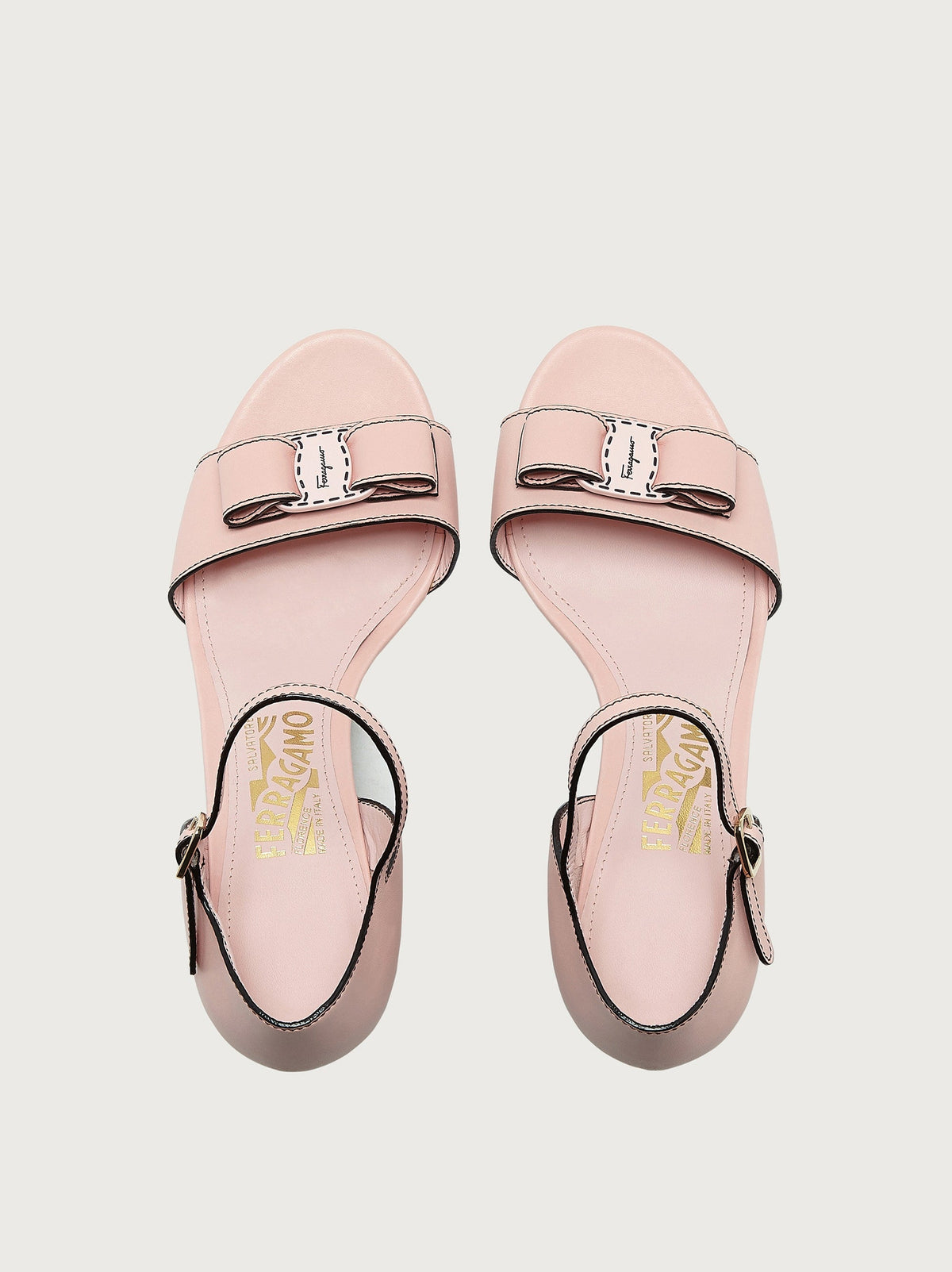 Salvatore Ferragamo light pink wedge sandal, top view showing bow detail