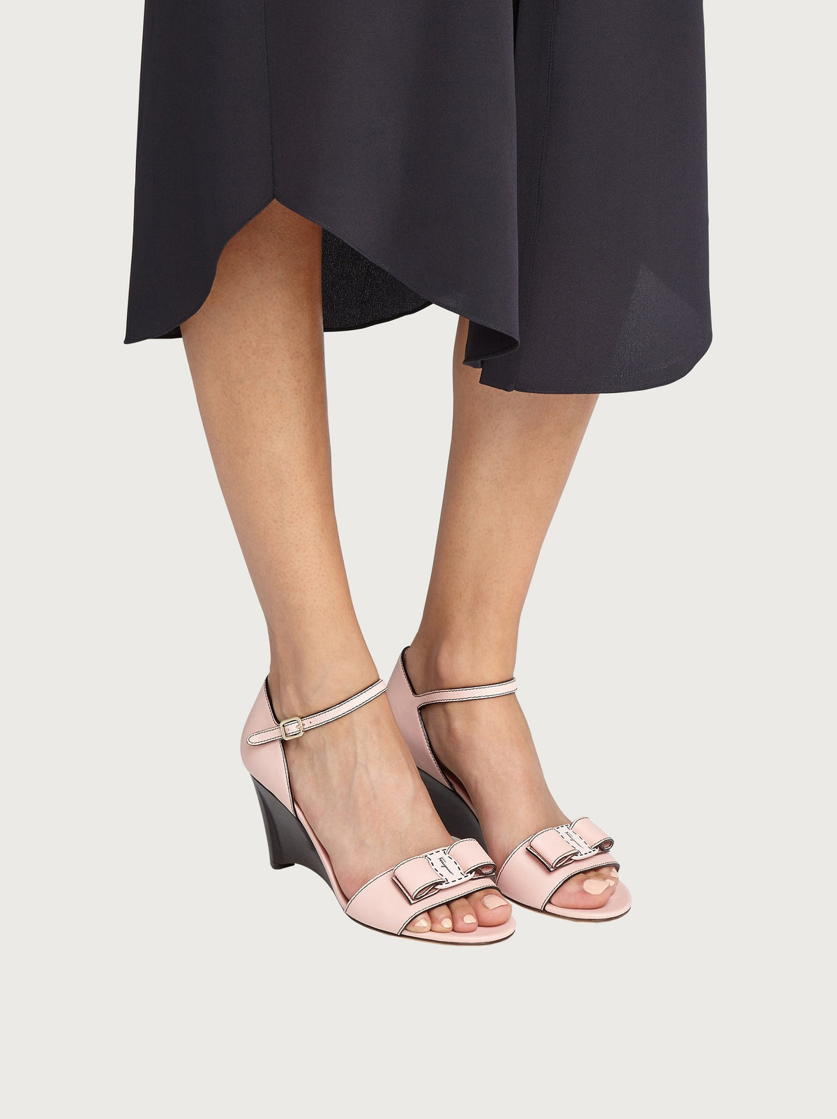 Light pink leather wedge sandal sole view, block heel by Salvatore Ferragamo