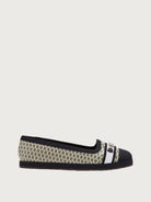 Cream jacquard ballet flat with black cap toe by Salvatore Ferragamo, side view