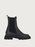 Black leather Oderico lace-up bootie with gold-tone Gancini hardware by Salvatore Ferragamo, side view