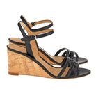 Black leather Salvatore Ferragamo Fieri 70 C sandal, rear view with cork wedge