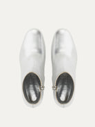 Salvatore Ferragamo silver bootie showing side zipper closure, angled view