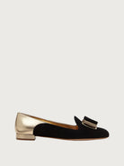 Black suede Salvatore Ferragamo Hausen 10 ballet flat with gold toe cap, side view