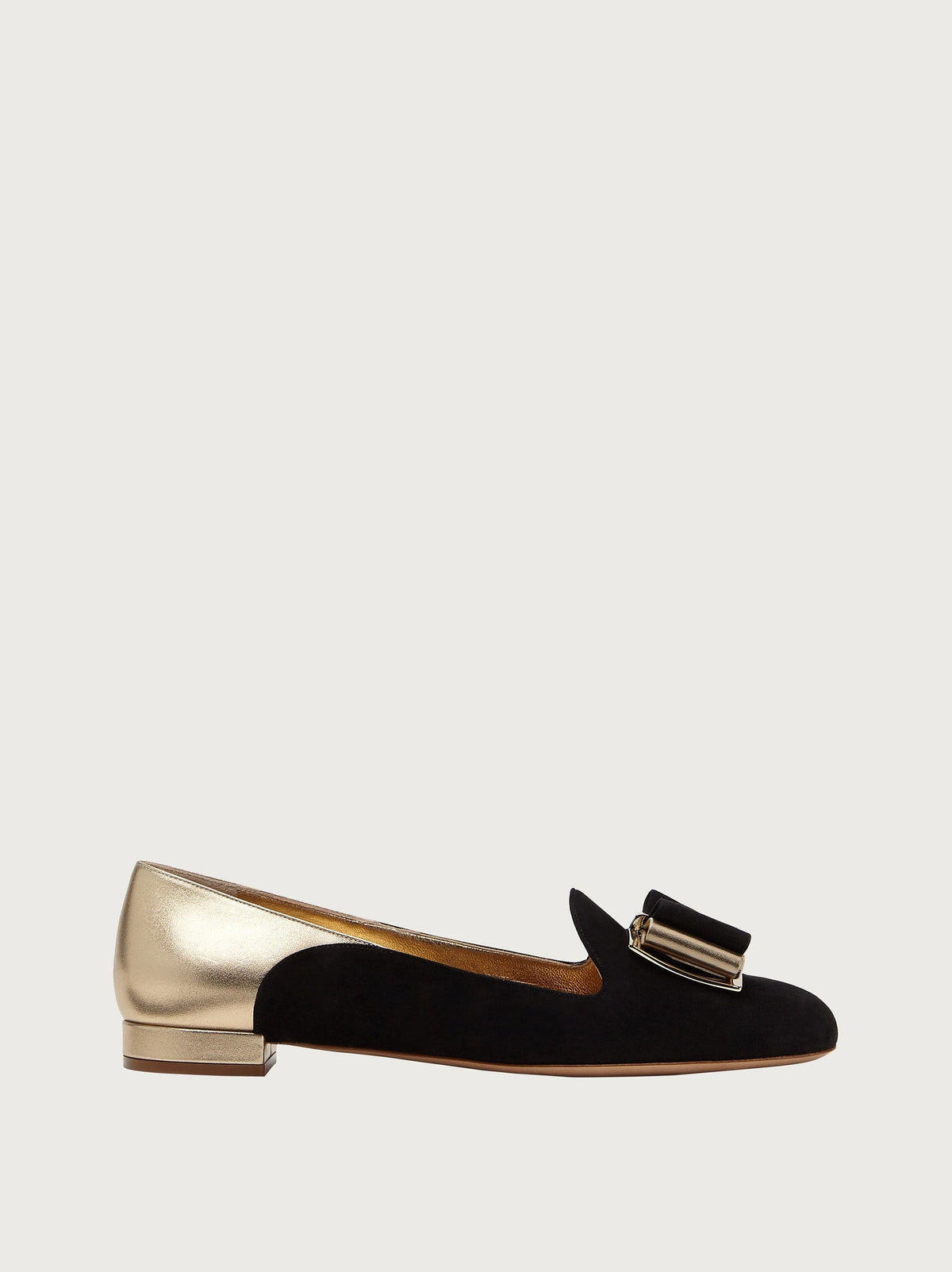 Black suede Salvatore Ferragamo Hausen 10 ballet flat with gold toe cap, side view