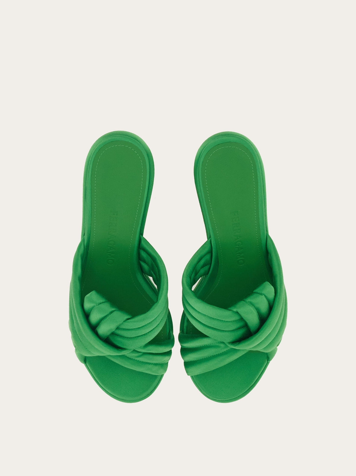 Bright green Salvatore Ferragamo wedge sandal with ribbed platform sole, front angle