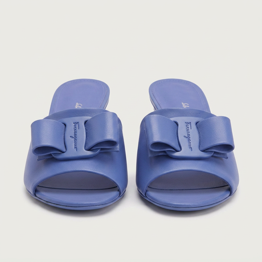 Blue leather Salvatore Ferragamo Valery 55 mule with oversized bow, side view