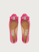 Dark pink Salvatore Ferragamo pump with Vara bow, front angle view