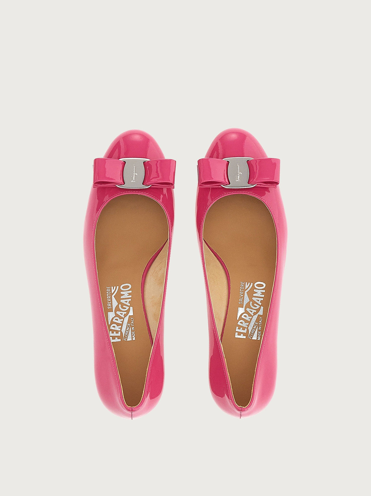 Dark pink Salvatore Ferragamo pump with Vara bow, front angle view