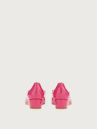 Dark pink Ferragamo Vara pump, top view showing round toe and bow
