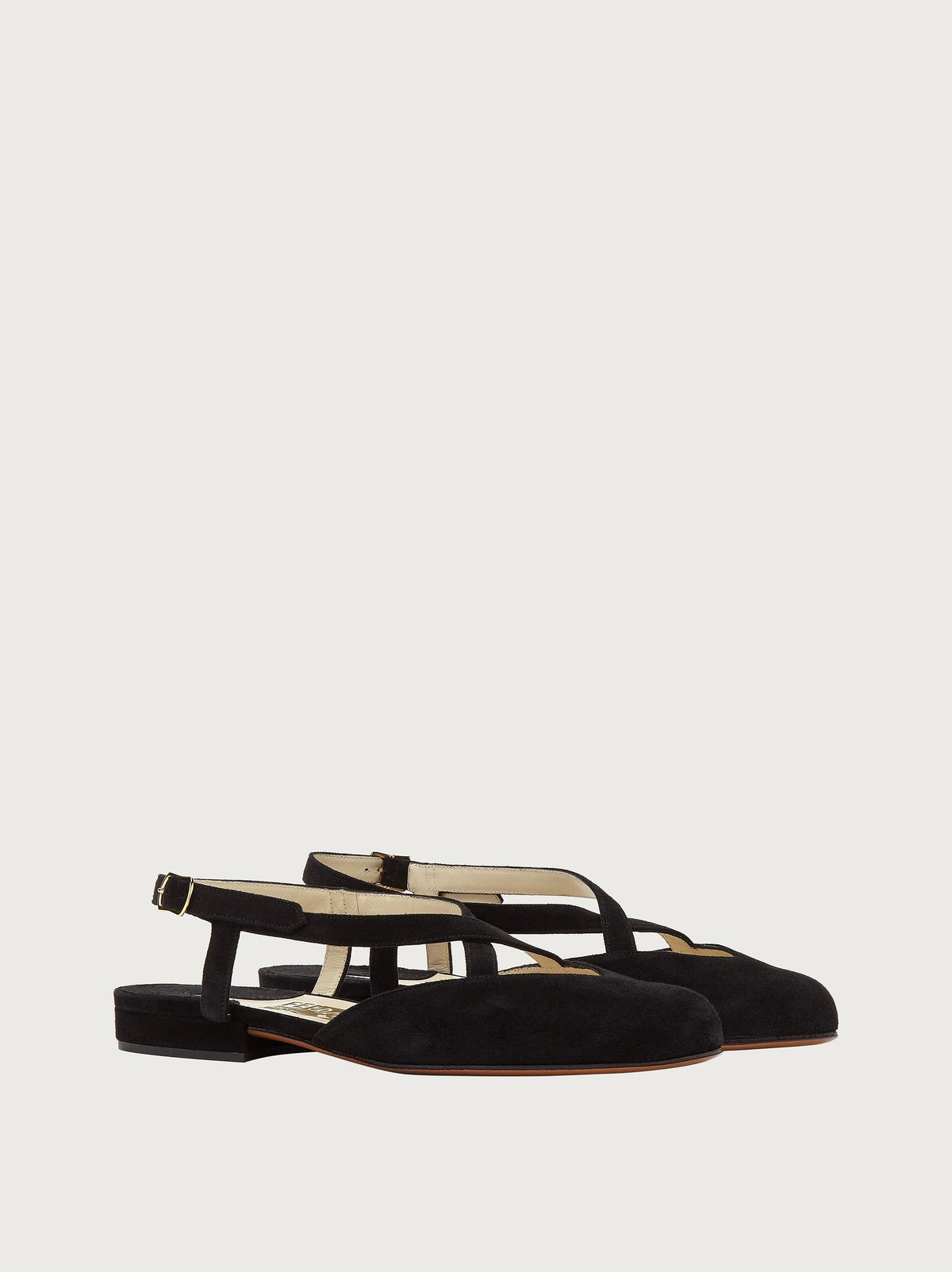 Black suede Oxalia sandal showing buckled ankle closure, front angle by Salvatore Ferragamo