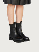 Black leather Salvatore Ferragamo Rook Chelsea boot, back view with pull tab