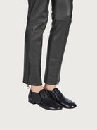 Black Salvatore Ferragamo Jayda loafer showing elastic side gusset detail