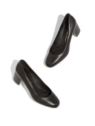 Black leather Medolla pump by Salvatore Ferragamo, detail of gold-tone block heel hardware