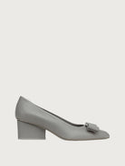 Light grey leather pointed-toe pump with bow detail, side view by Salvatore Ferragamo