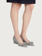 Salvatore Ferragamo light grey leather pump, sole and heel construction view