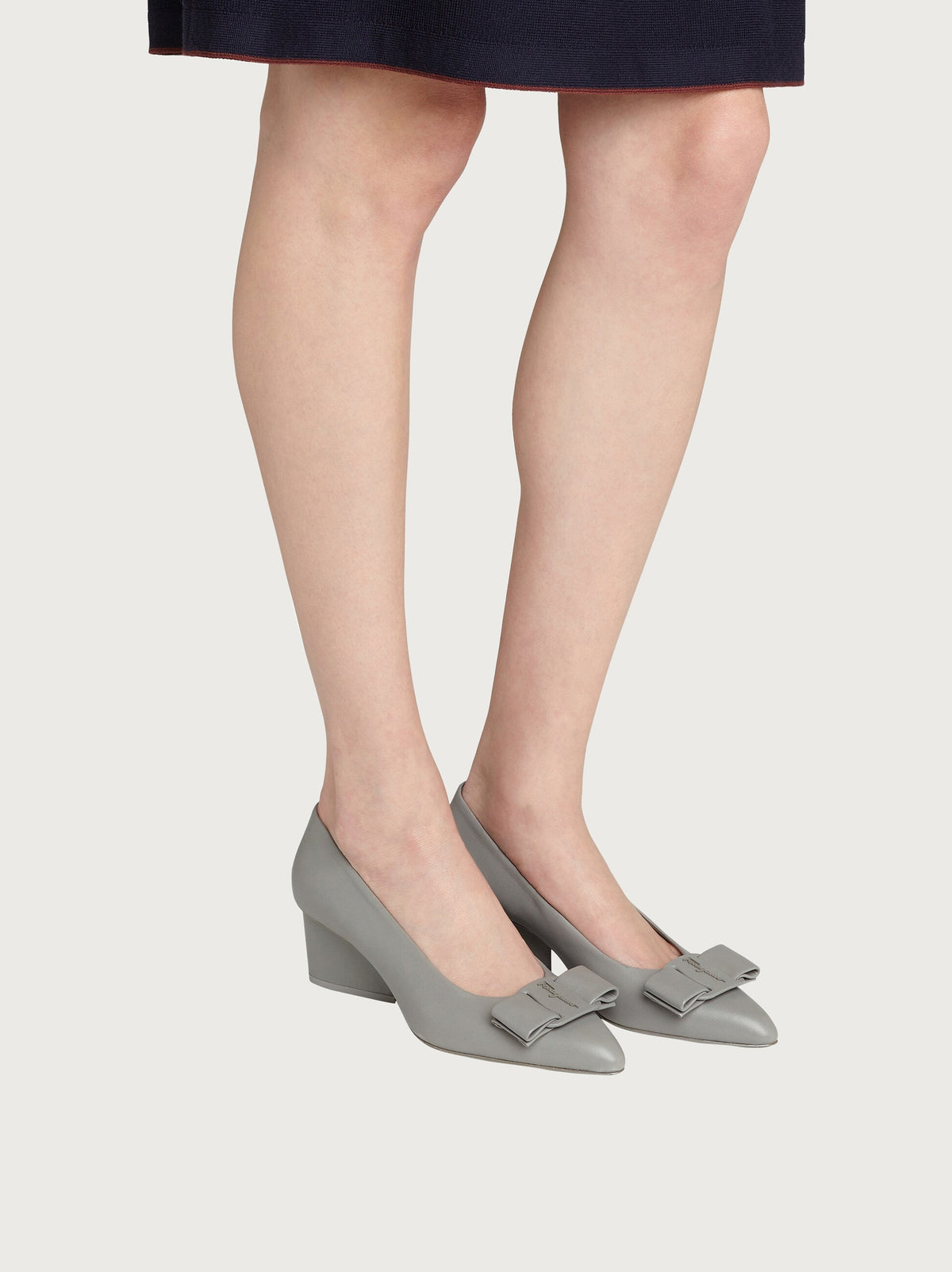 Salvatore Ferragamo light grey leather pump, sole and heel construction view