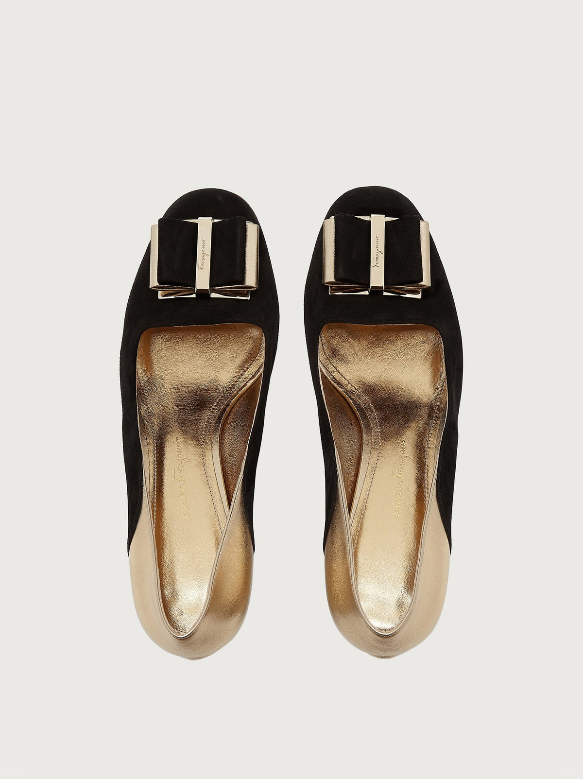 Black suede Salvatore Ferragamo pump with block heel, rear view