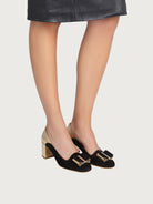 Black suede Salvatore Ferragamo pump with pointed toe, top view
