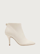 White leather ankle bootie with pointed toe by Salvatore Ferragamo, side view