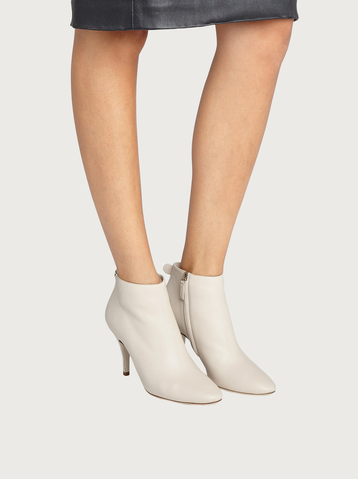 Salvatore Ferragamo white leather bootie with stiletto heel, sole detail
