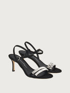 Black suede Salvatore Ferragamo Idwige sandal showing crystal embellishment close-up