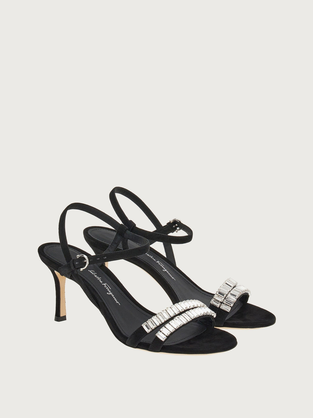 Black suede Salvatore Ferragamo Idwige sandal showing crystal embellishment close-up