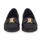 Black quilted Salvatore Ferragamo Kacy P Gal ballet flat with gold buckles, side view