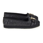Black quilted Salvatore Ferragamo Kacy P Gal ballet flat, detail of gold-tone buckles