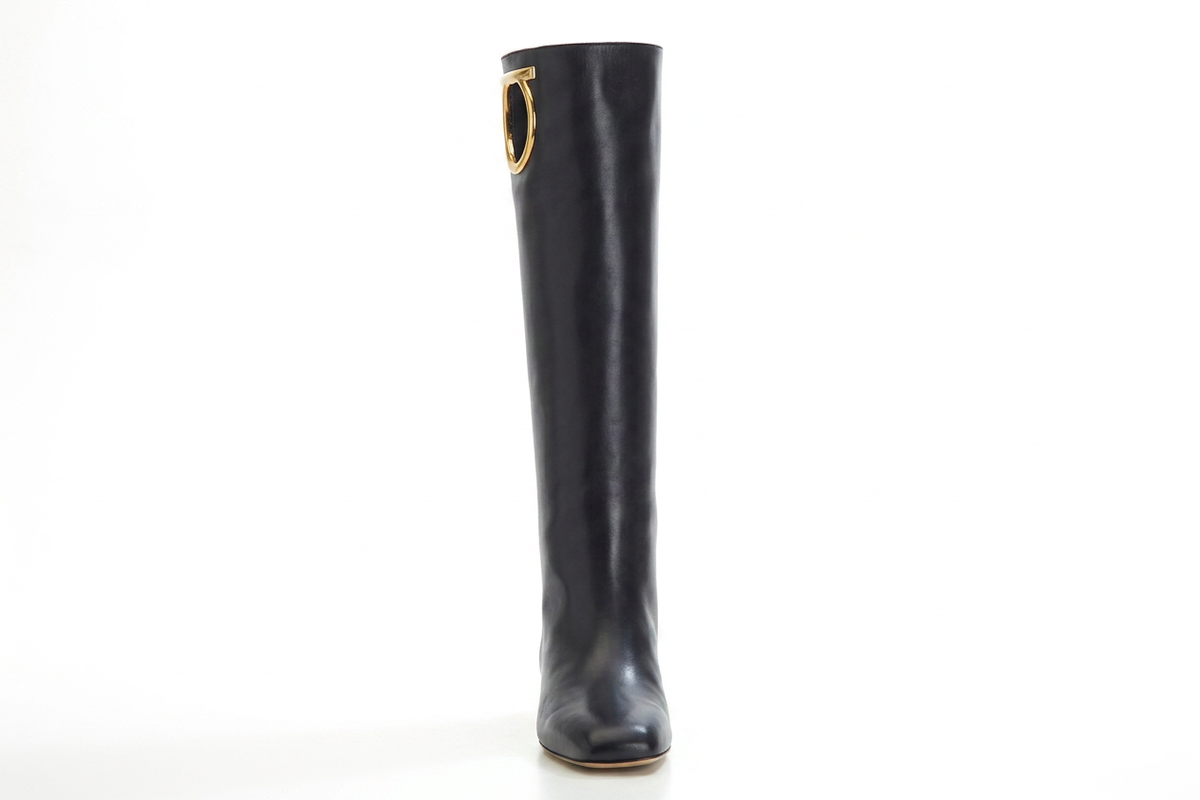 Black leather Salvatore Ferragamo Avio 10 knee-high boot with gold-tone Gancini cutout, side view