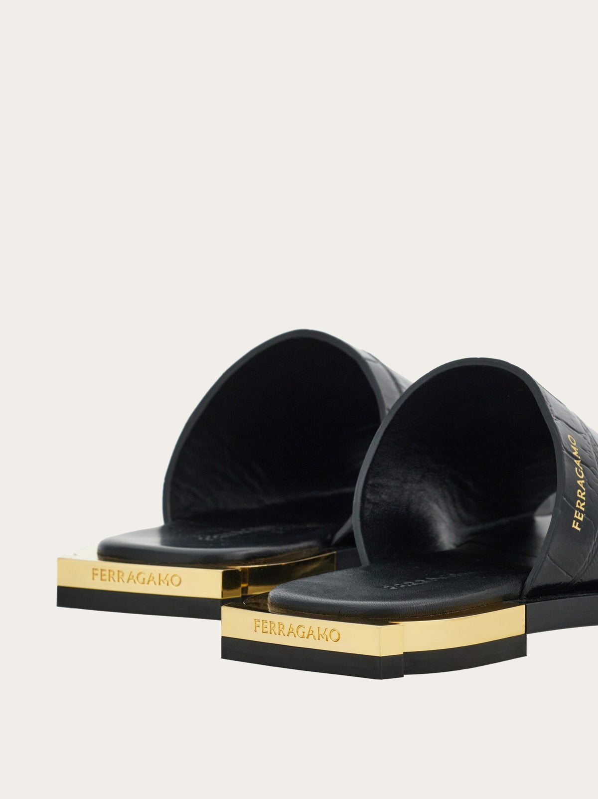 Salvatore Ferragamo black slide sandals, front three-quarter view