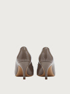Taupe-grey Salvatore Ferragamo peep-toe pump showing stiletto heel, rear view
