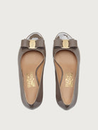 Salvatore Ferragamo pump with grosgrain bow and hardware detail, close-up