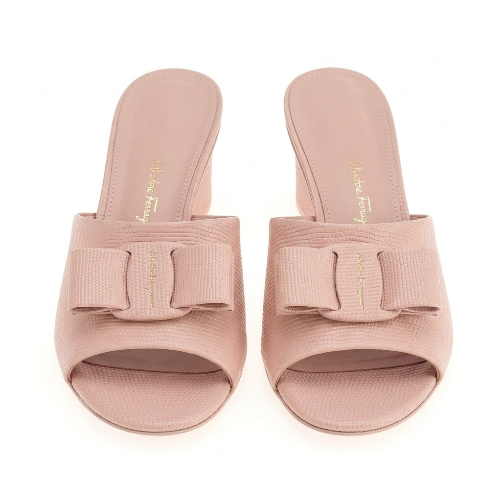 Light pink leather mule with grosgrain bow, side view by Salvatore Ferragamo