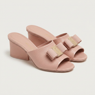 Light pink Salvatore Ferragamo Valery 55 mule, front view showing bow detail