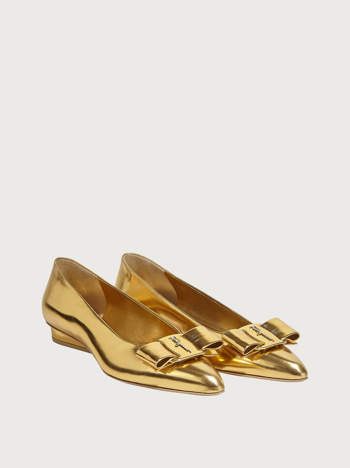 Salvatore Ferragamo ballet flat in metallic gold, rear view with block heel
