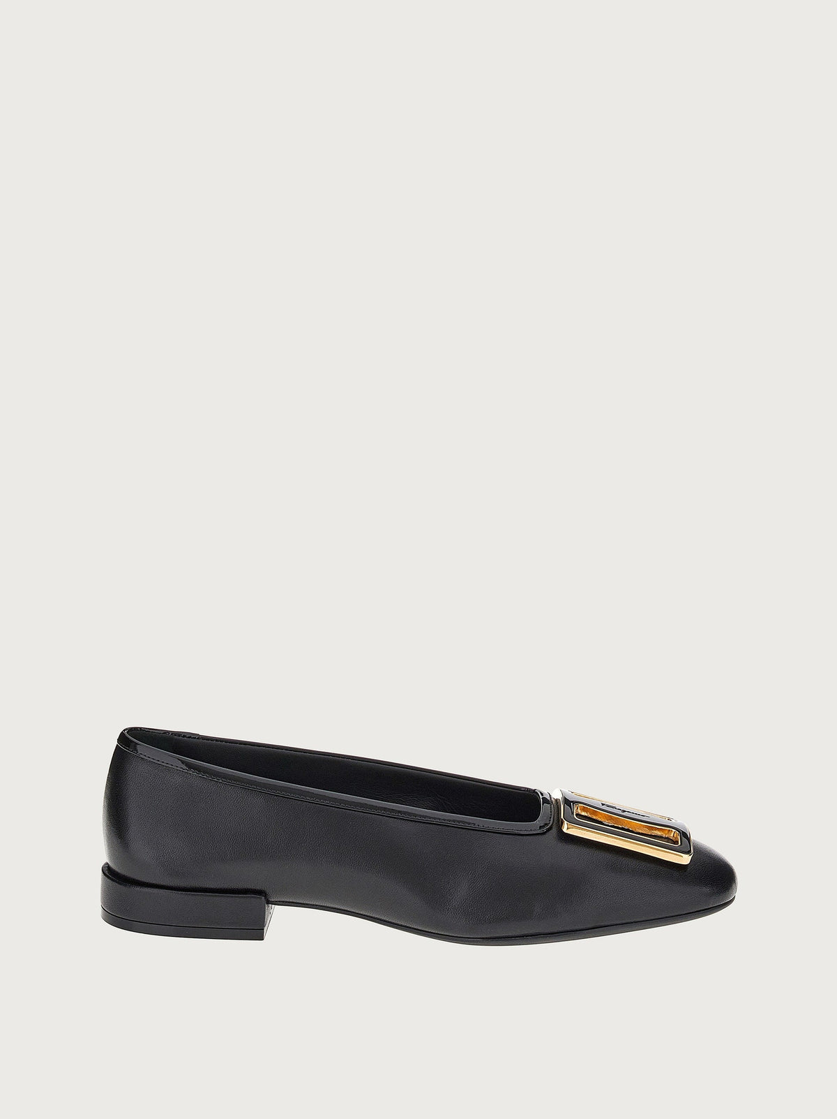 Black Salvatore Ferragamo Myrna ballet flat with golden buckle, side view