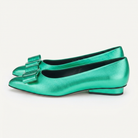 Salvatore Ferragamo green leather ballet flat showing bow detail, front angle