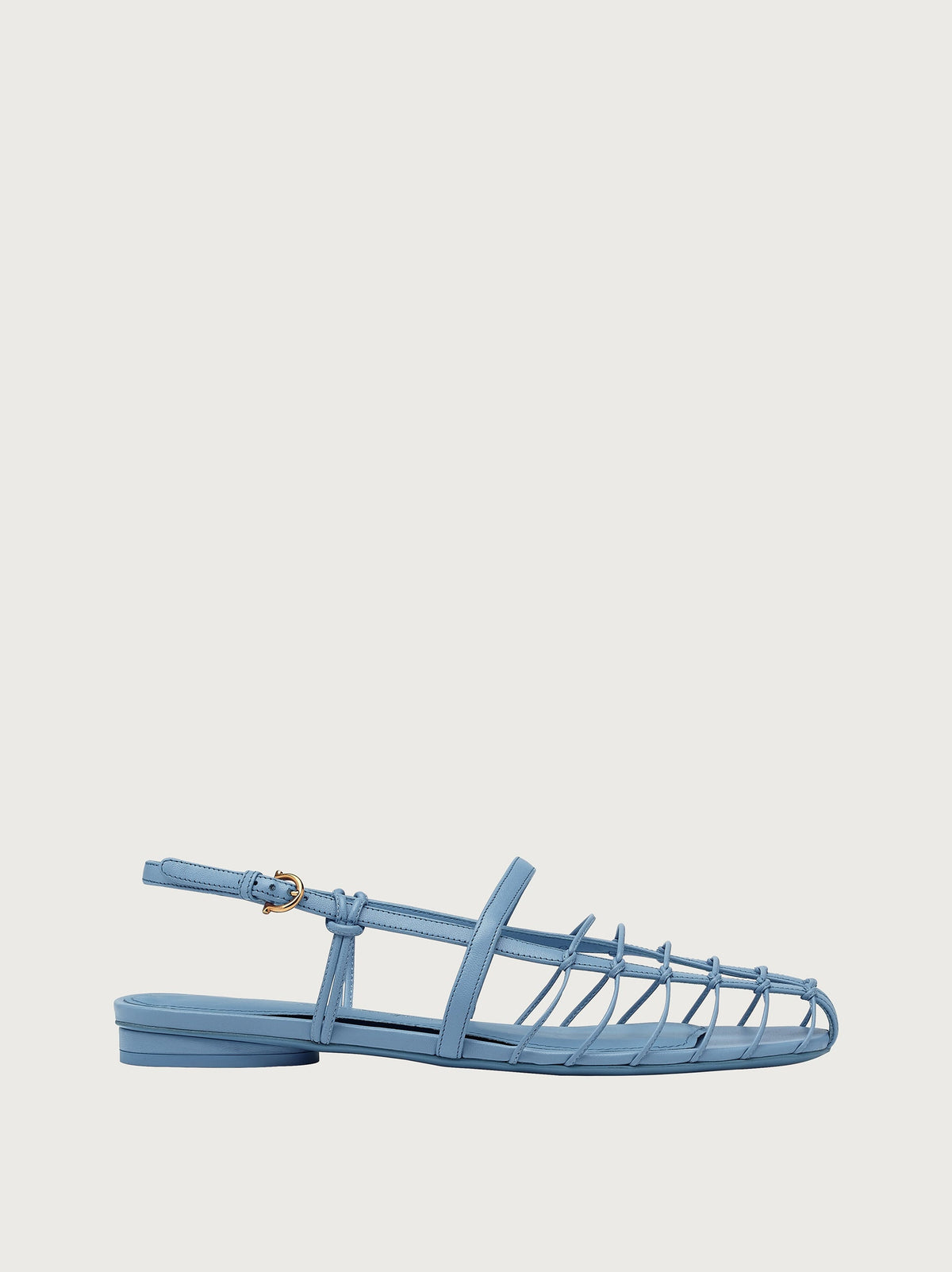 Light blue Salvatore Ferragamo Shay 10 flat sandal with caged straps, side view