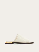 White croc-embossed leather slide sandal with gold hardware, front three-quarter view by Salvatore Ferragamo