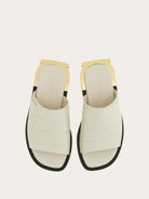White Salvatore Ferragamo Aline C slide sandal, side profile showing gold-tone heel hardware