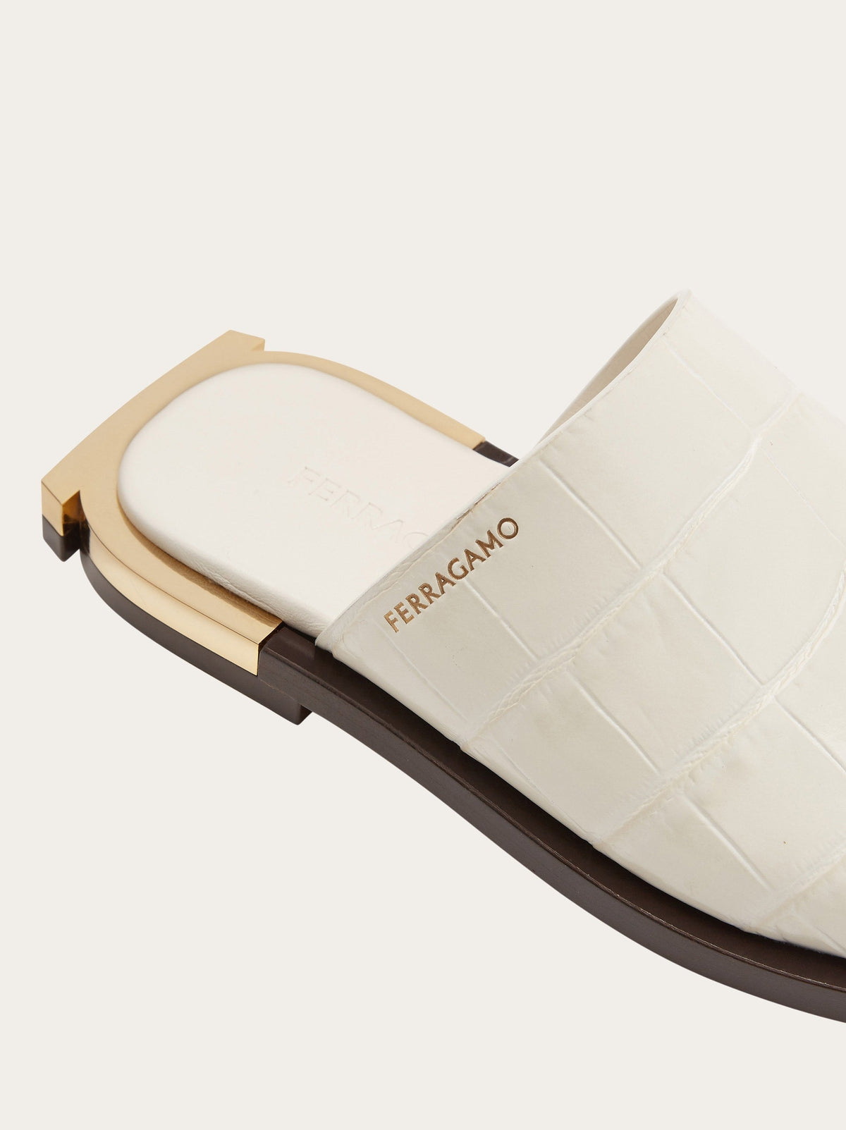 Salvatore Ferragamo white leather slide sandal, alternate angle showing textured upper