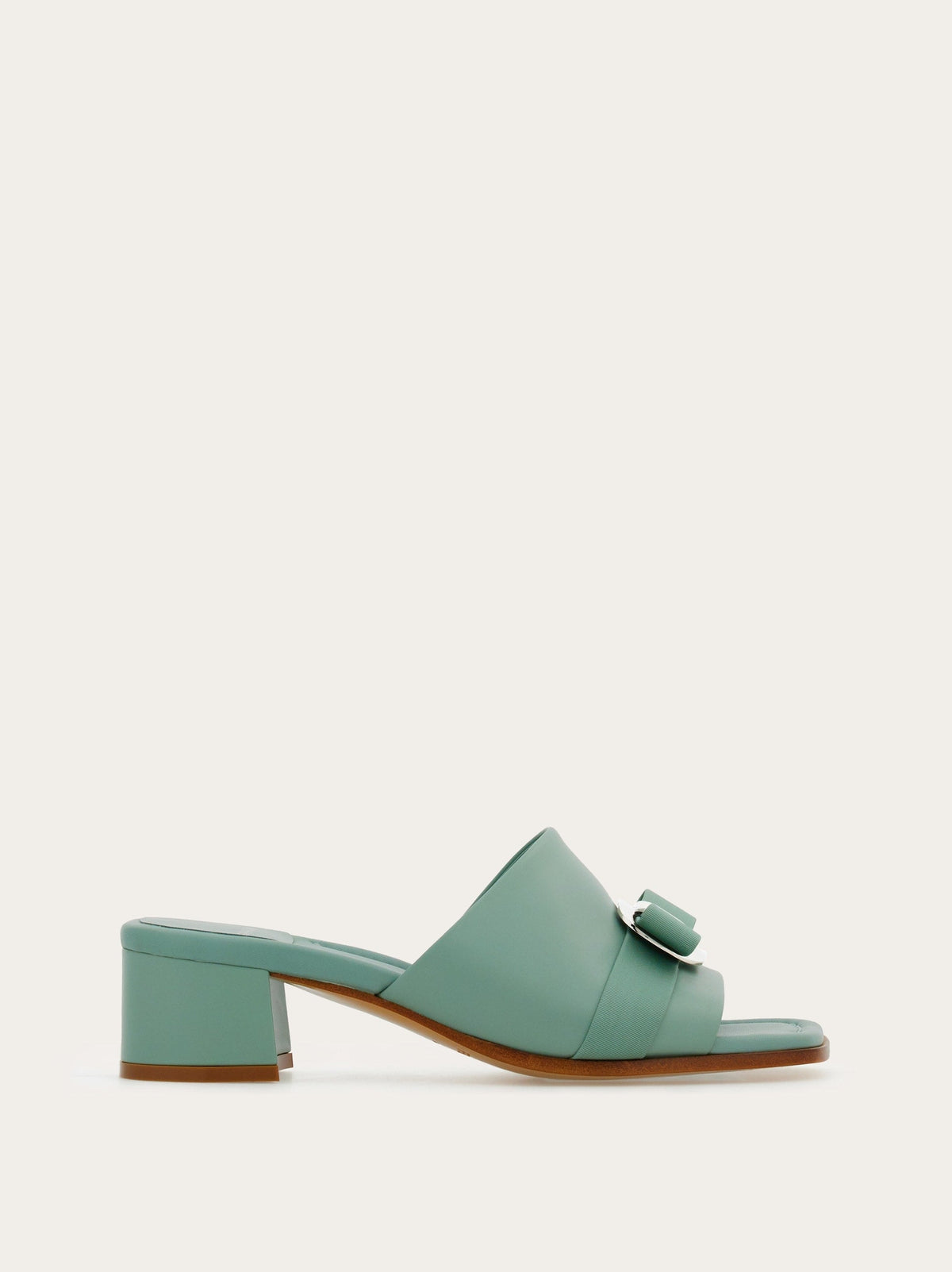Light olive green Salvatore Ferragamo Vara Plate slides with grosgrain bow, front view