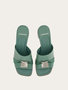 Light olive green Salvatore Ferragamo Vara Plate slides, side profile view