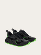 Black Salvatore Ferragamo Cosimina sneaker showing ridged rubber sole