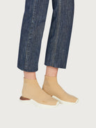Beige Salvatore Ferragamo Ninette sneaker with ripple heel detail, rear view