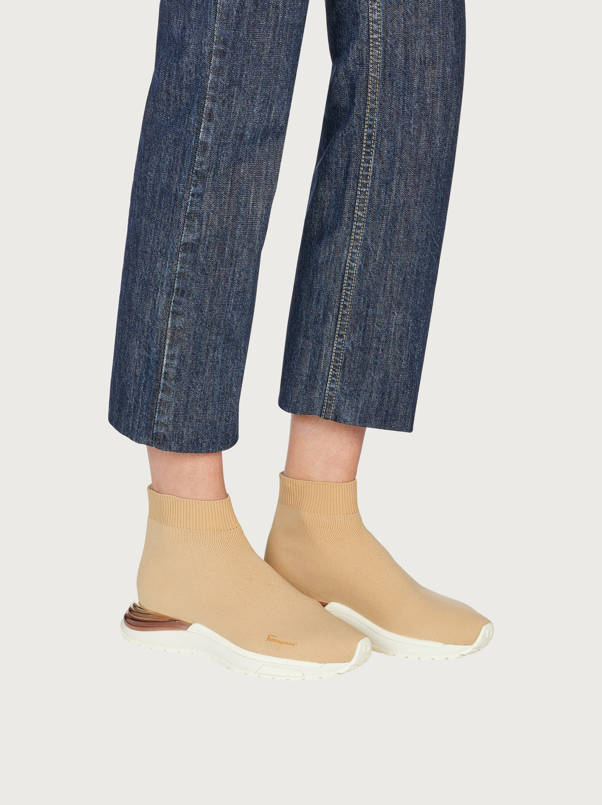 Beige Salvatore Ferragamo Ninette sneaker with ripple heel detail, rear view