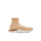 Beige Salvatore Ferragamo Ninette sneaker high-shine ripple detail close-up